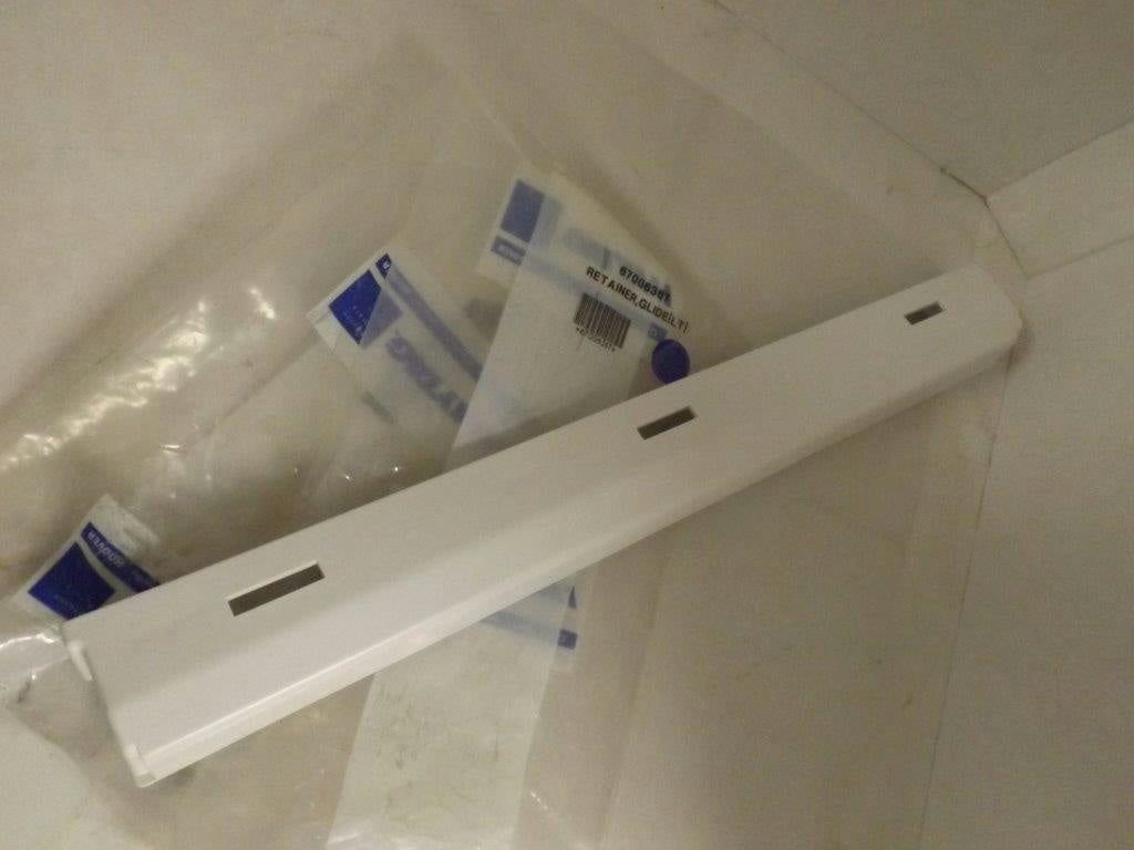 MAYTAG WHIRLPOOL REFRIGERATOR 67006367 LEFT GLIDE RETAINER NEW MAYTAG WHIRLPOOL REFRIGERATOR 67006367 LEFT GLIDE RETAINER NEW